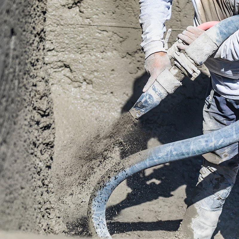 Close-up of concrete placement using fiber reinforcement