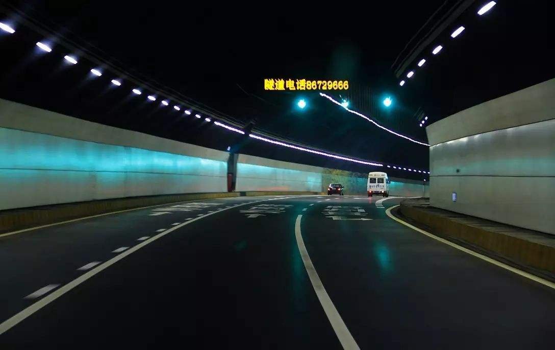 Night view inside the subsea tunnel with vehicles and clean slab joints