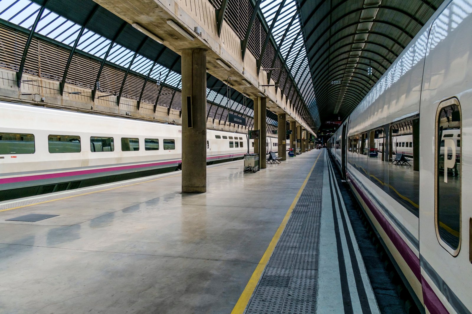 Urban station platform showing parapet and edge detailing on slab concrete