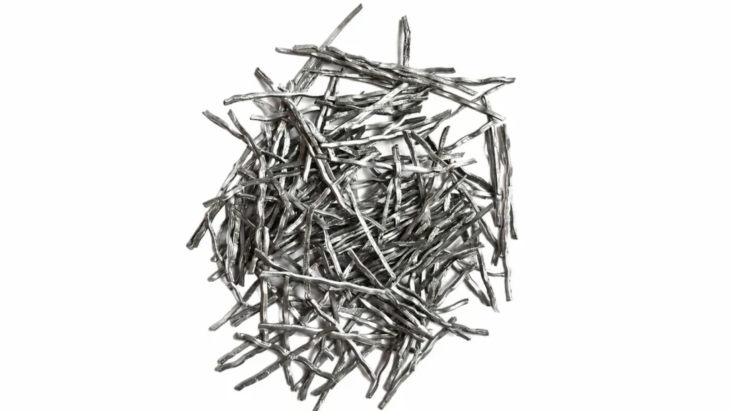 Fibra de aço ondulada com perfil ondulado para uma aderência mais forte no concreto reforçado com fibras.